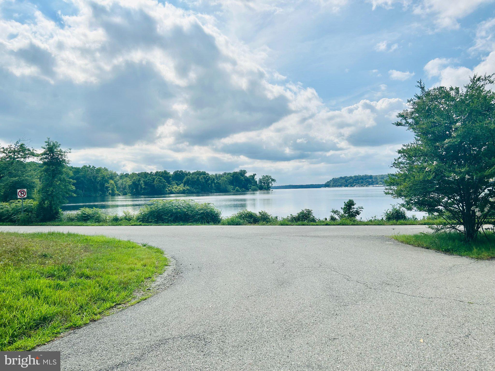 14500 Leonard Calvert Drive Accokeek, MD 20607 - Photo 1 of 18 Serene lakeside view awaits you.
