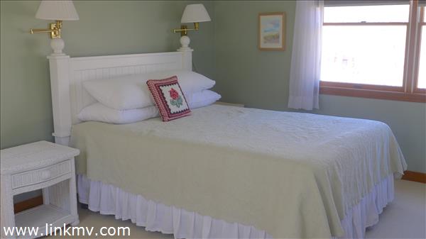 79 Old Purchase Road Edgartown, MA 02539 - Photo 13 of 14 a bedroom with a bed and a window