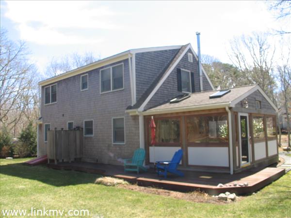 79 Old Purchase Road Edgartown, MA 02539 - Photo 8 of 14 a view of a house with yard