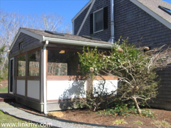 79 Old Purchase Road Edgartown, MA 02539 - Photo 9 of 14 a view of a door of the house