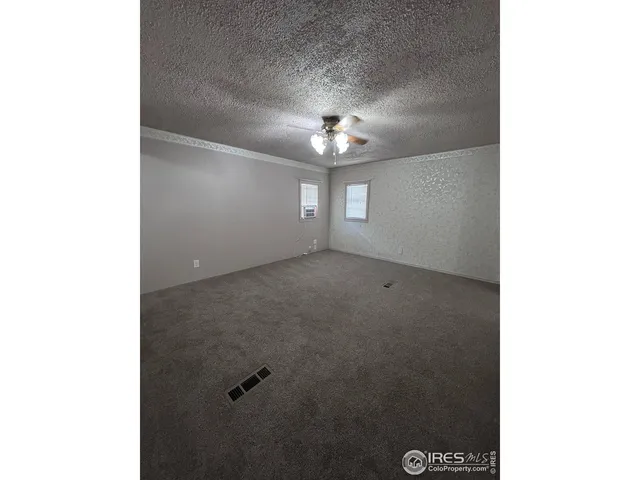 $289,000 | 114 Linden Drive, Log Lane Village, CO 80705