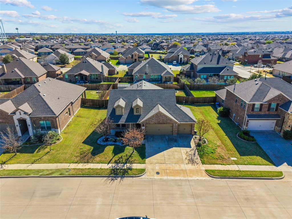 3031 Lily Lane Forney, TX 75126 - Photo 23 of 28 an aerial view of a house with a swimming pool