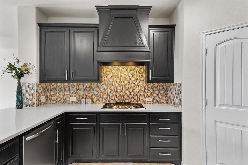 3031 Lily Lane Forney, TX 75126 - Photo 10 of 28 a bathroom with a sink and a mirror