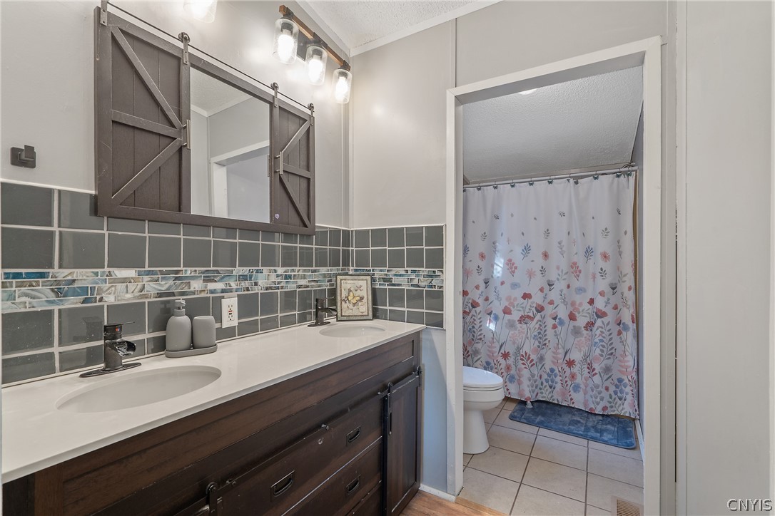 252 Cornell Road Hastings, NY 13076 - Photo 16 of 30 This updated anteroom/dressing room with double si