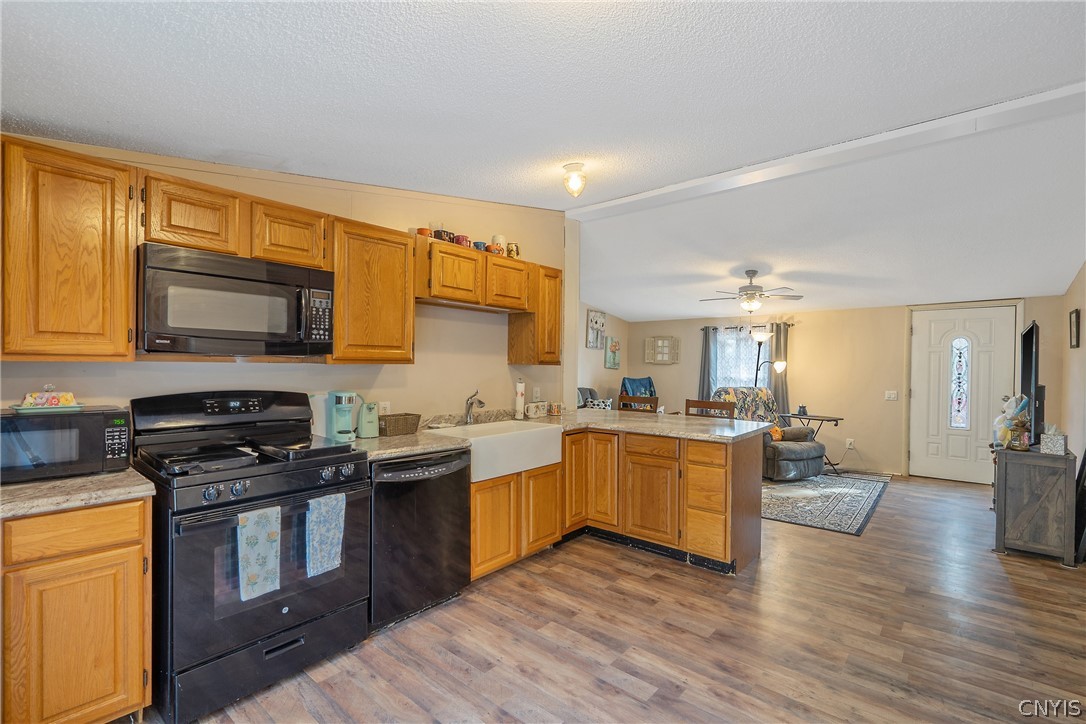 252 Cornell Road Hastings, NY 13076 - Photo 8 of 30 The oak cabinetry gleams and is quite abundant - a