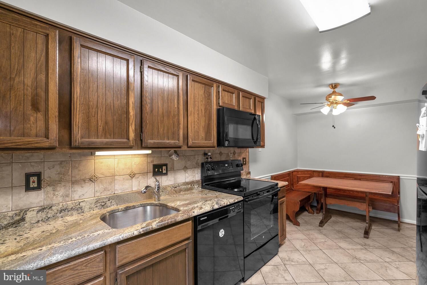 1051 Windrush Lane, Unit 1 Sandy Spring, MD 20860 - Photo 14 of 45 Kitchen Features Granite Counters!