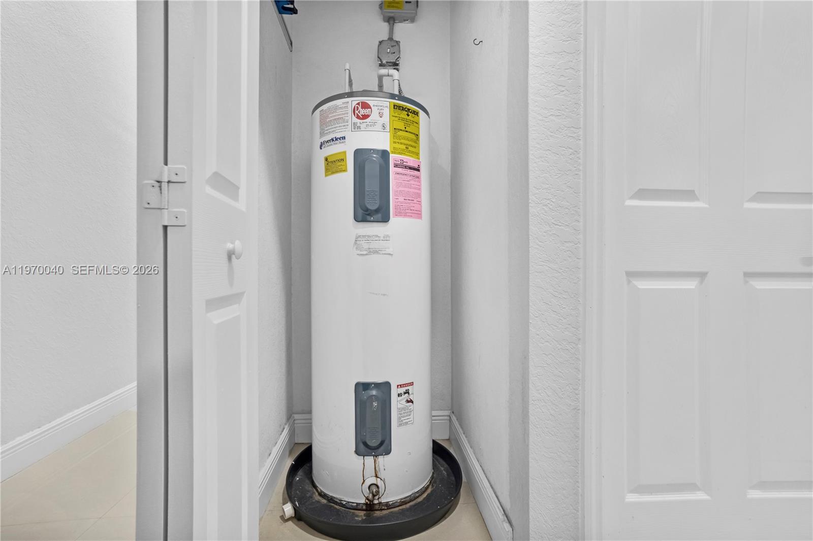 2132 Northeast 38th Road Homestead, FL 33033 - Photo 21 of 48 a bathroom with a sink and a mirror