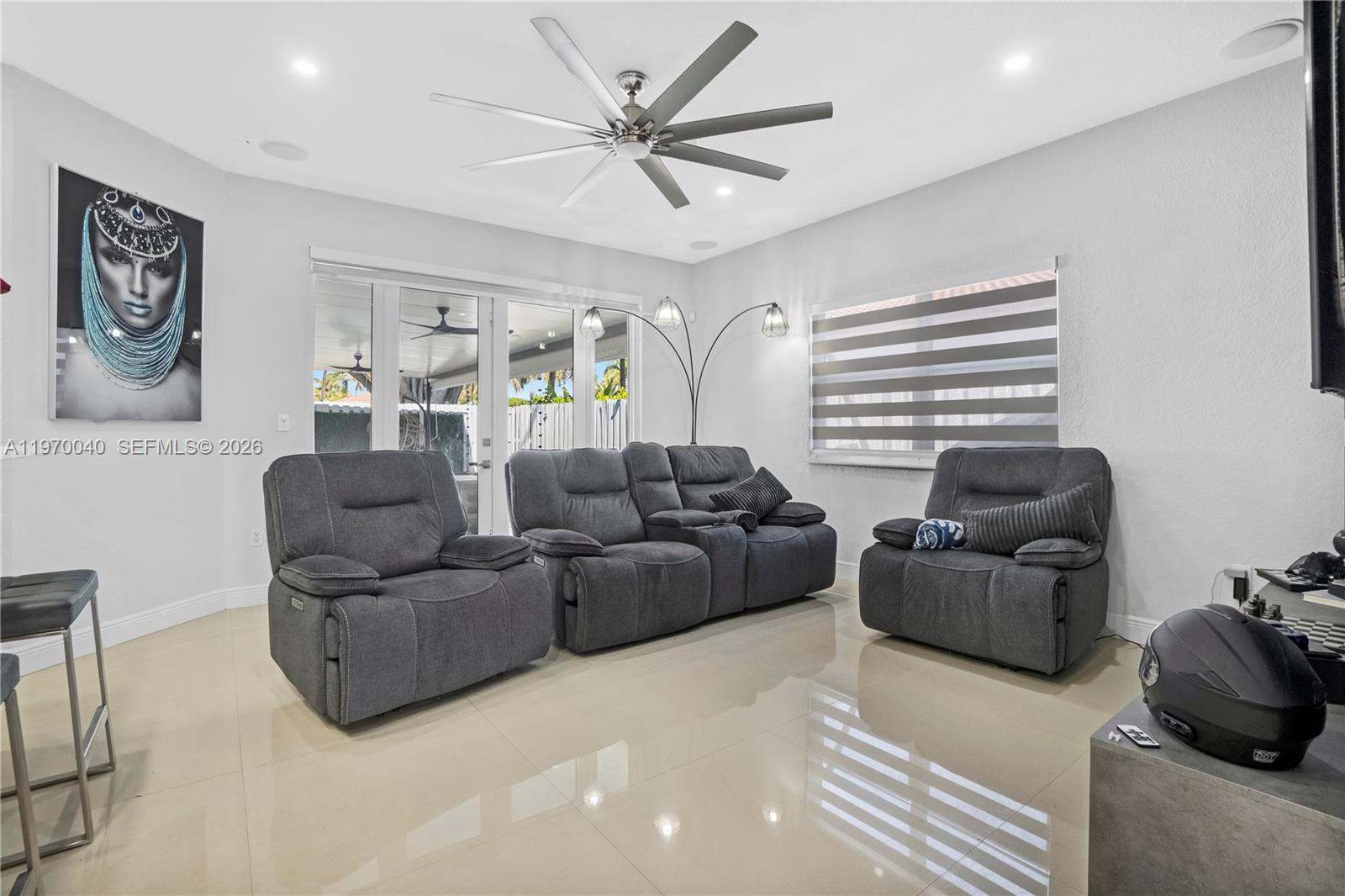2132 Northeast 38th Road Homestead, FL 33033 - Photo 28 of 48 a living room with furniture and a large window