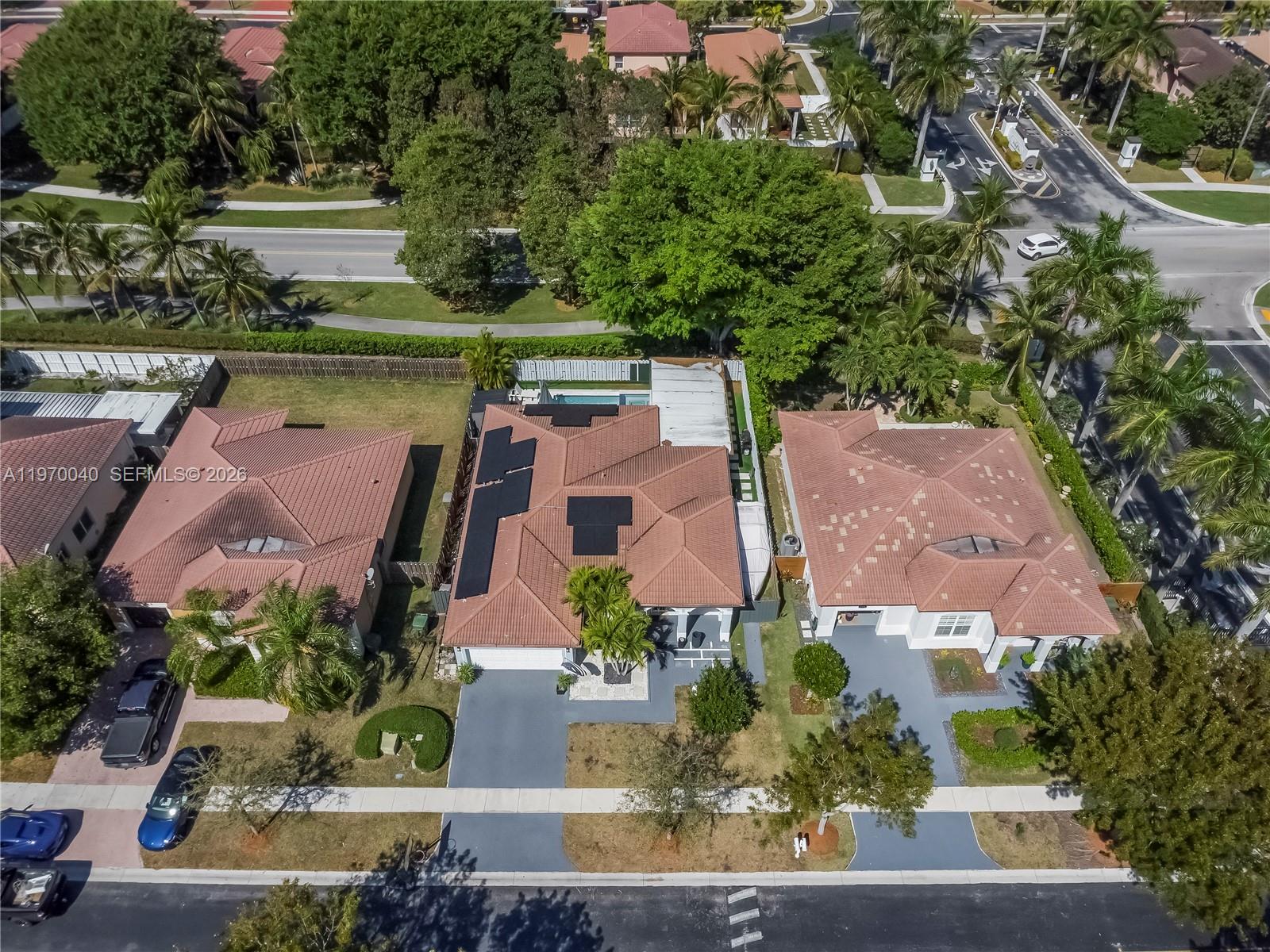 2132 Northeast 38th Road Homestead, FL 33033 - Photo 3 of 48 an aerial view of house with yard swimming pool and outdoor seating