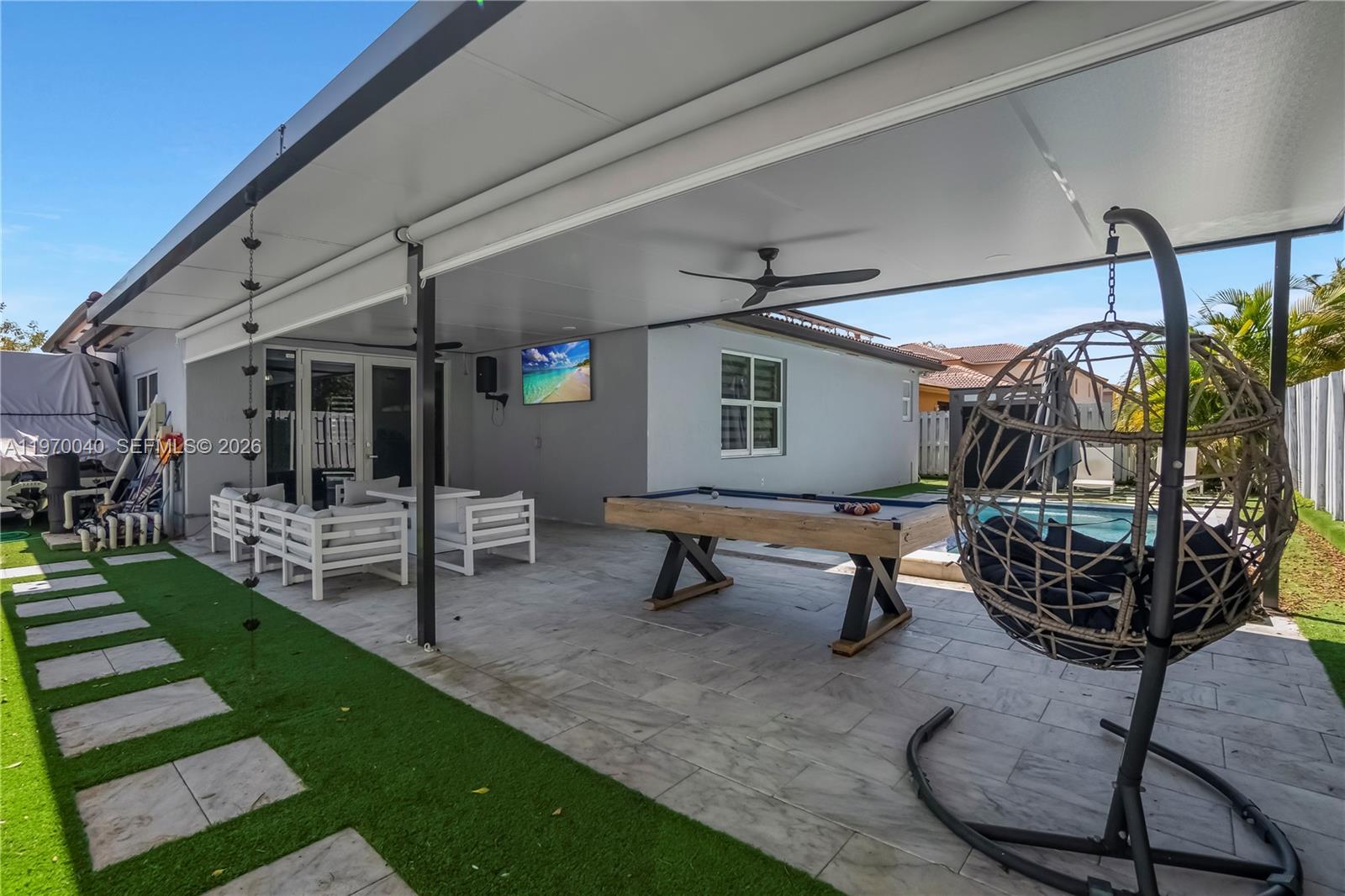 2132 Northeast 38th Road Homestead, FL 33033 - Photo 32 of 48 a view of a backyard with a patio