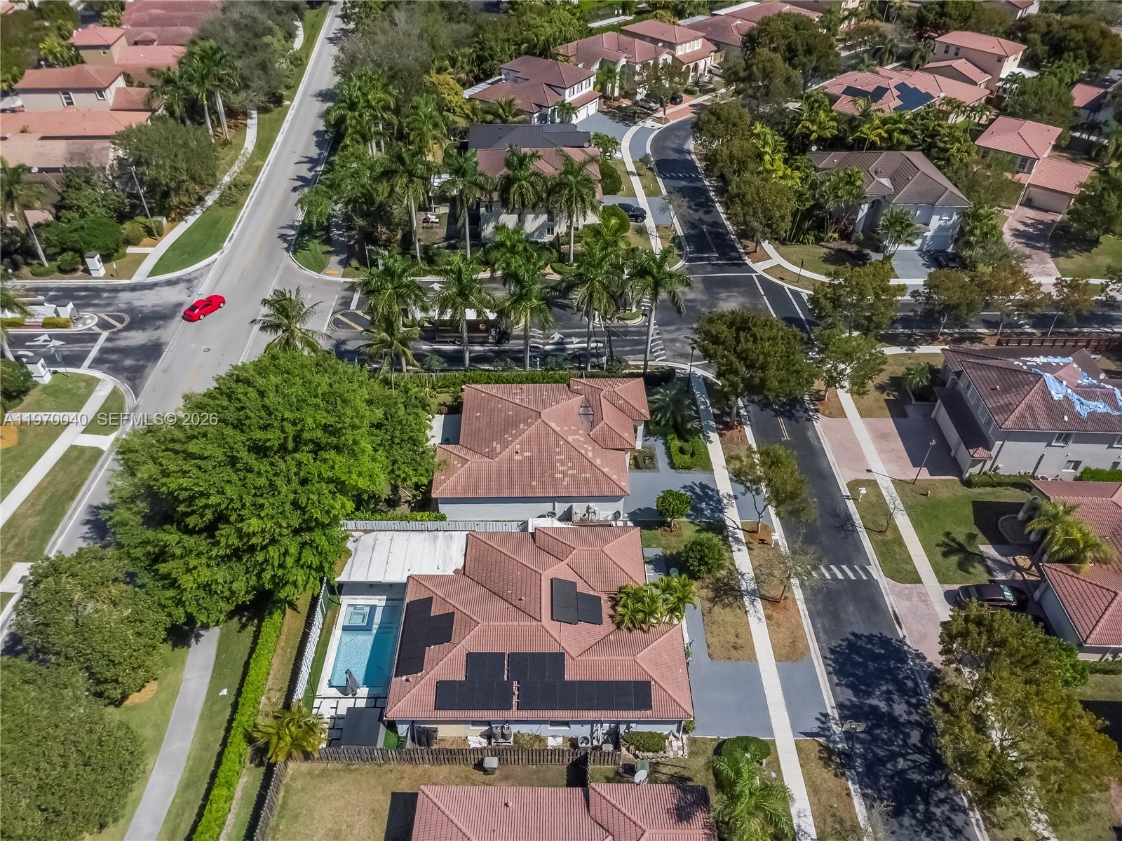 2132 Northeast 38th Road Homestead, FL 33033 - Photo 34 of 48 an aerial view of multiple houses with yard