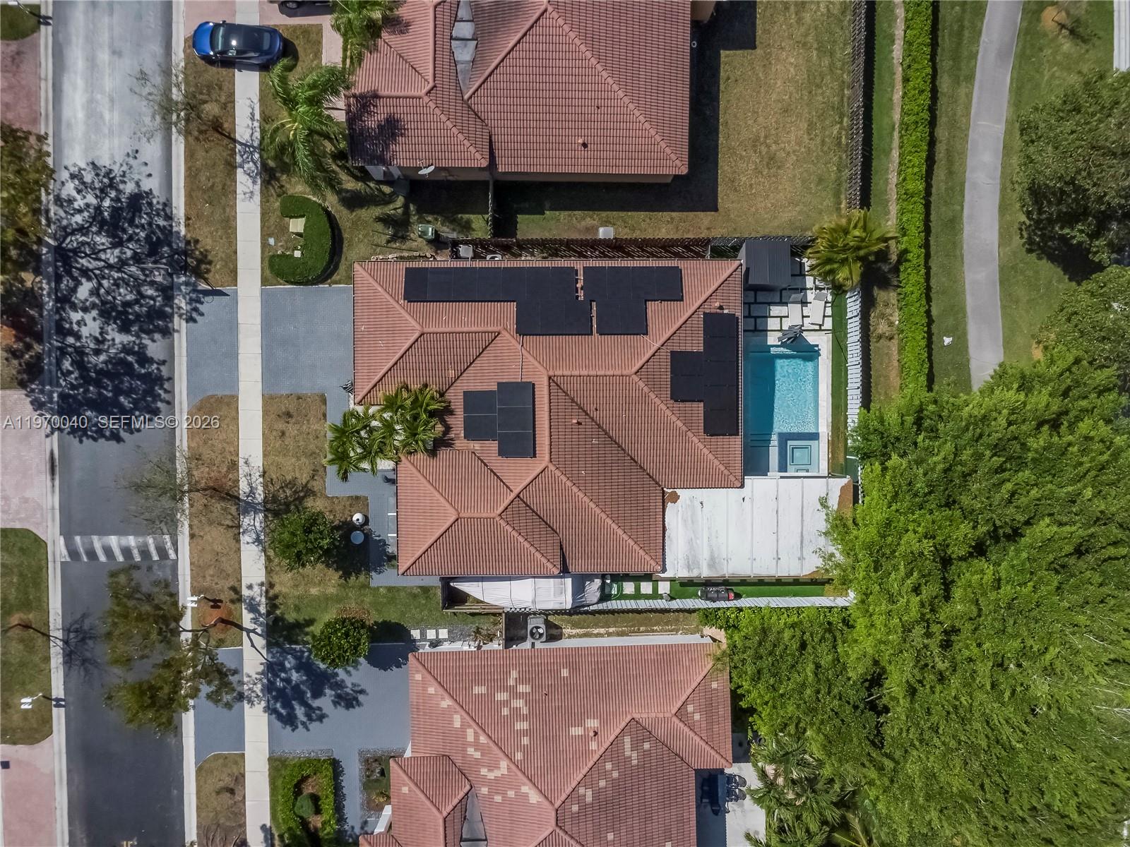 2132 Northeast 38th Road Homestead, FL 33033 - Photo 35 of 48 an aerial view of a house with yard and trees