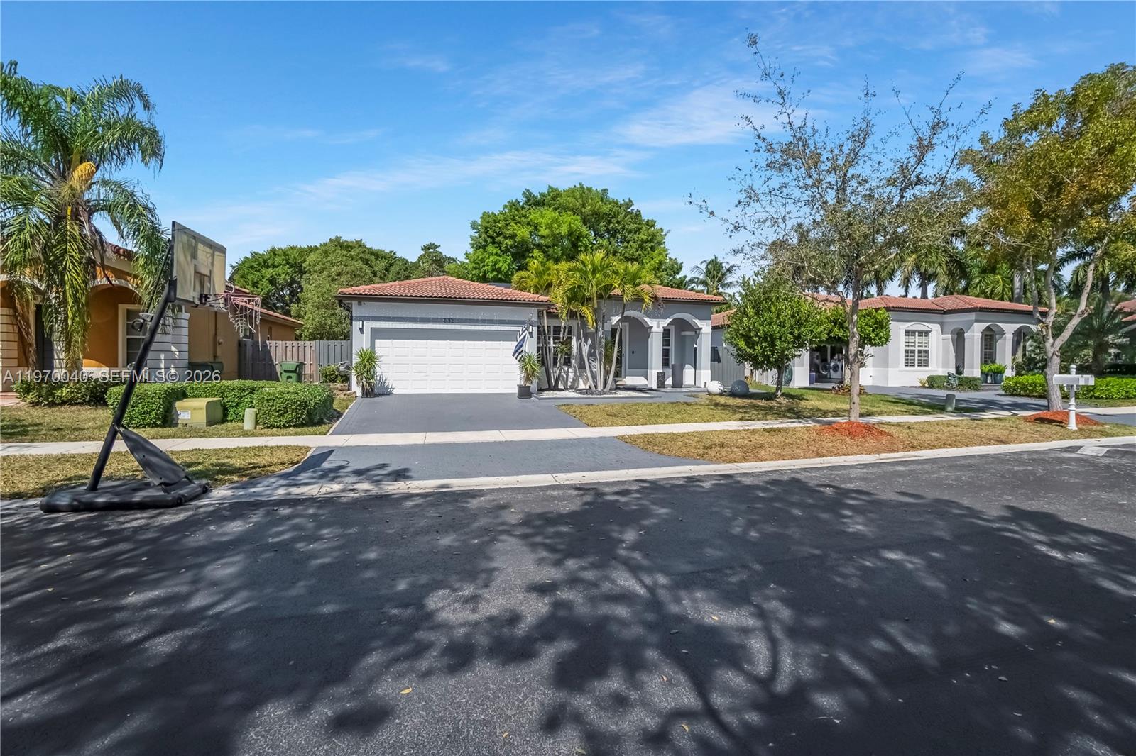 2132 Northeast 38th Road Homestead, FL 33033 - Photo 44 of 48 a house with palm tree in front of it