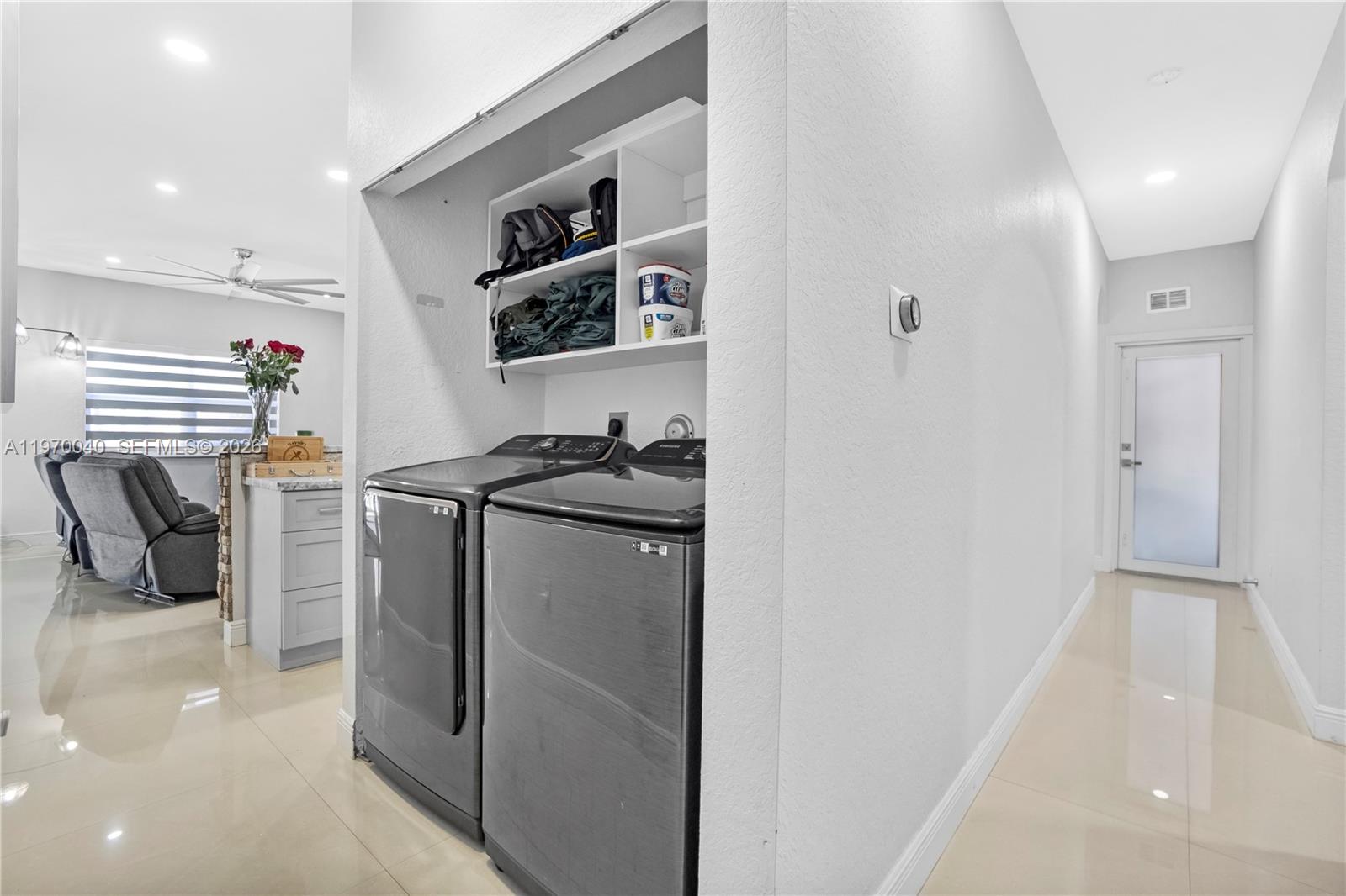 2132 Northeast 38th Road Homestead, FL 33033 - Photo 45 of 48 a storage room with washer and dryer