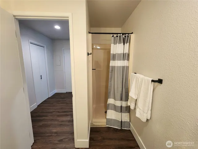 a view of dining room and wooden floor