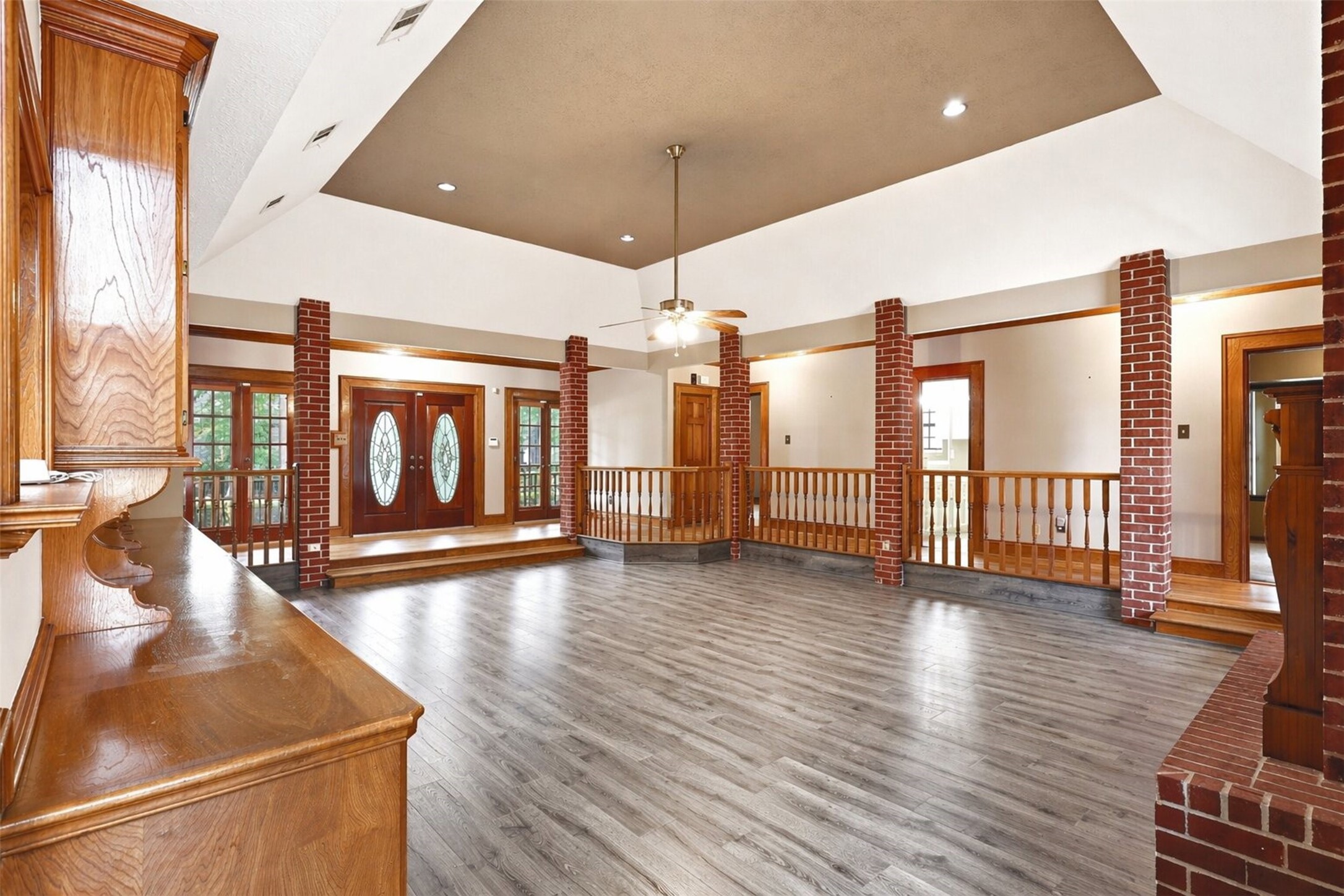 6118 Hampton Way Court Spring, TX 77389 - Photo 6 of 27 View of the front double door multi-level entry. Brick and wood combination throughout the living area. Ceiling fan offers additional air circulation.