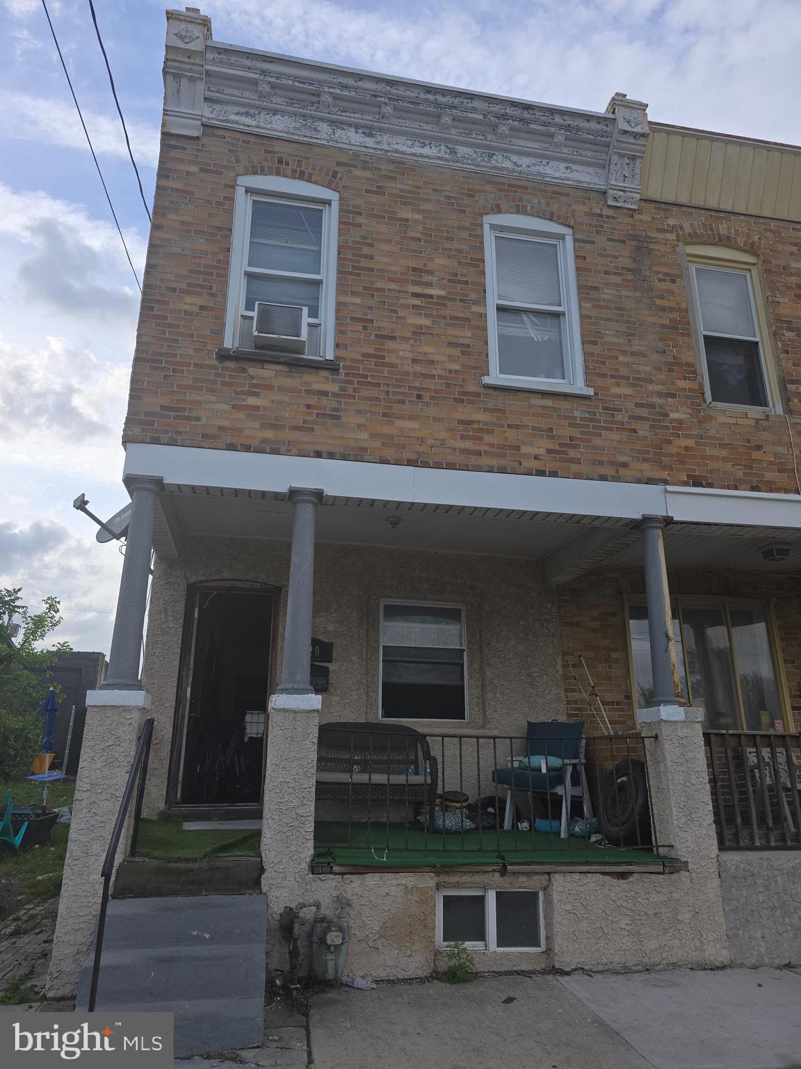 620 West 2nd Street Chester, PA 19013 - Photo 2 of 24 a front view of a house with stairs