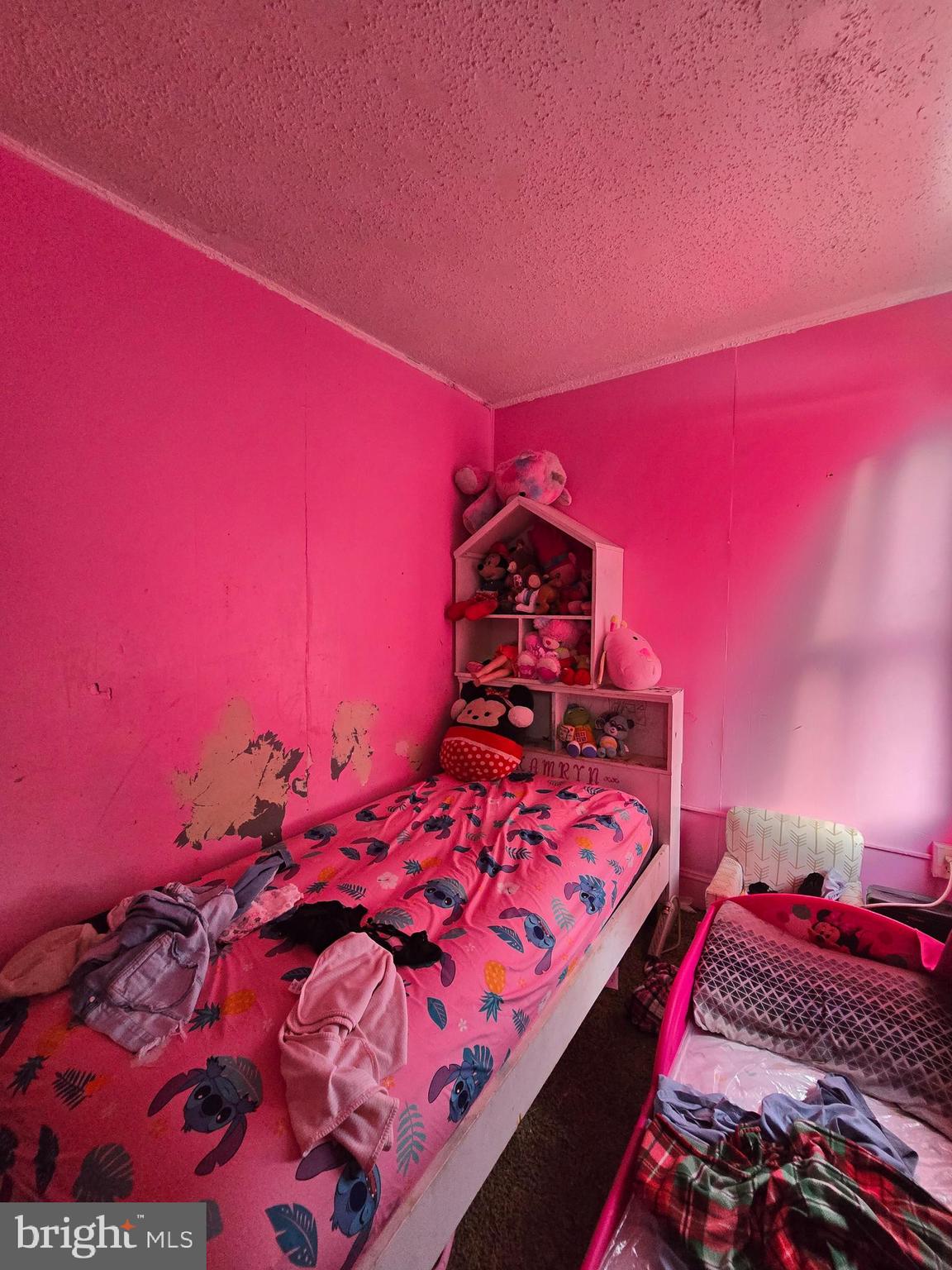 620 West 2nd Street Chester, PA 19013 - Photo 24 of 24 a bed room with a bed and a lamp