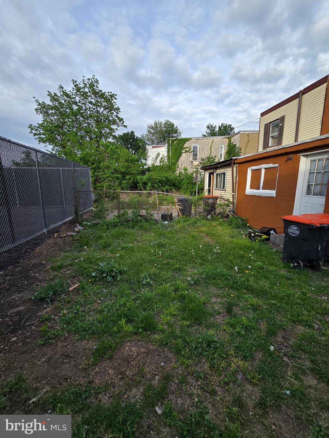 620 West 2nd Street Chester, PA 19013 - Photo 4 of 24 a front view of a house with garden