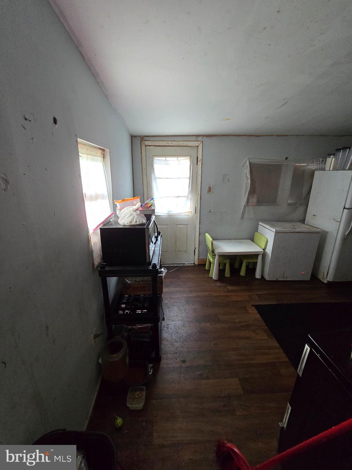 620 West 2nd Street Chester, PA 19013 - Photo 8 of 24 a living room with furniture and wooden floor