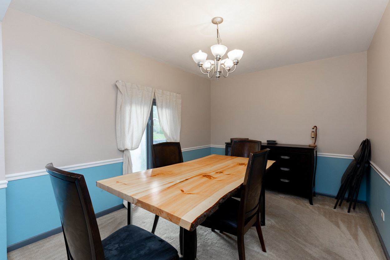 3570 Arthur Road Crete, IL 60417 - Photo 14 of 38 a view of a dining room with a table and chairs
