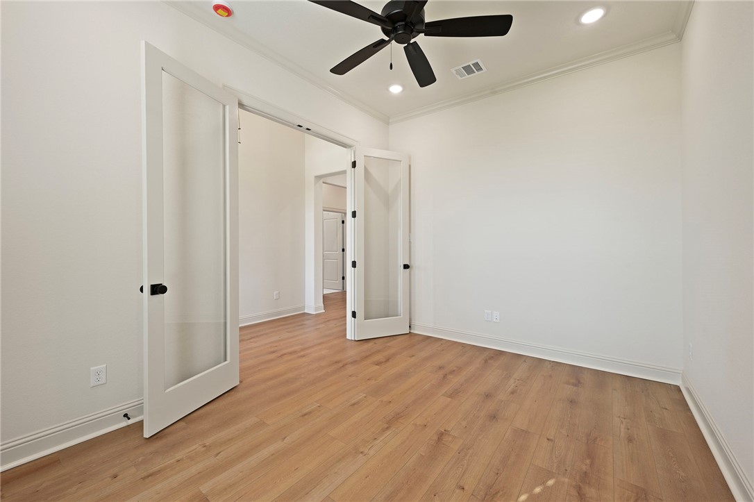 7052 Skipping Rock Path Bryan, TX 77808 - Photo 17 of 23 a view of an empty room