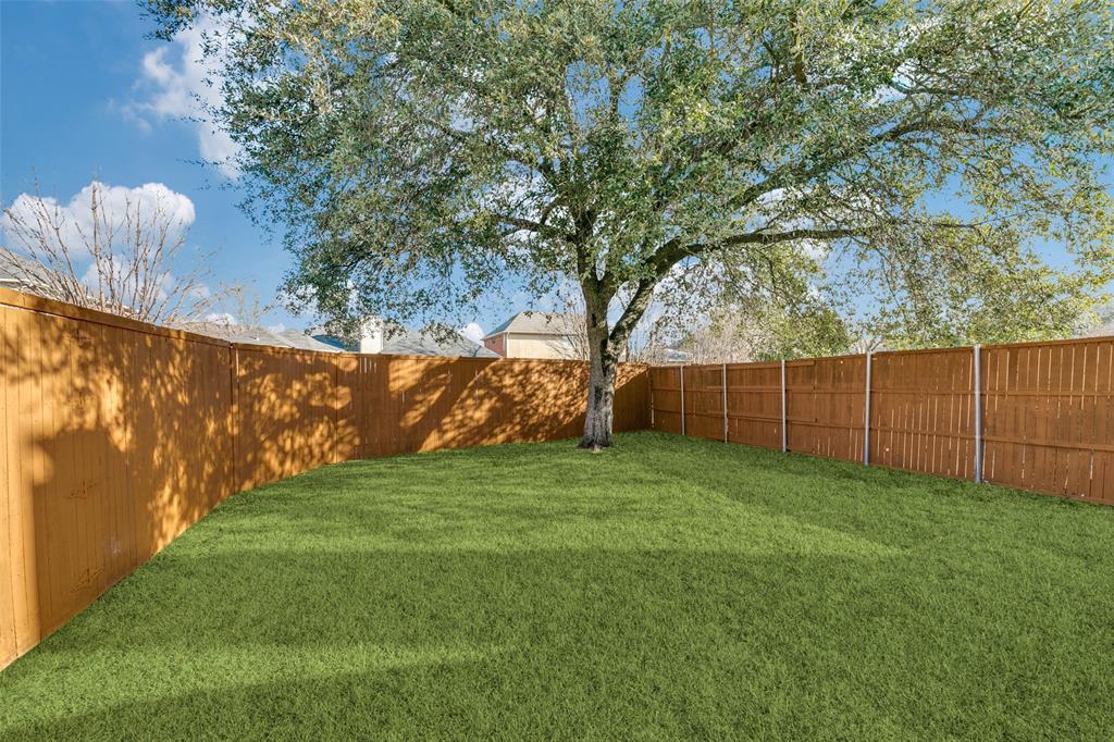 1913 Smith Drive Plano, TX 75023 - Photo 12 of 12 a view of a yard with an trees