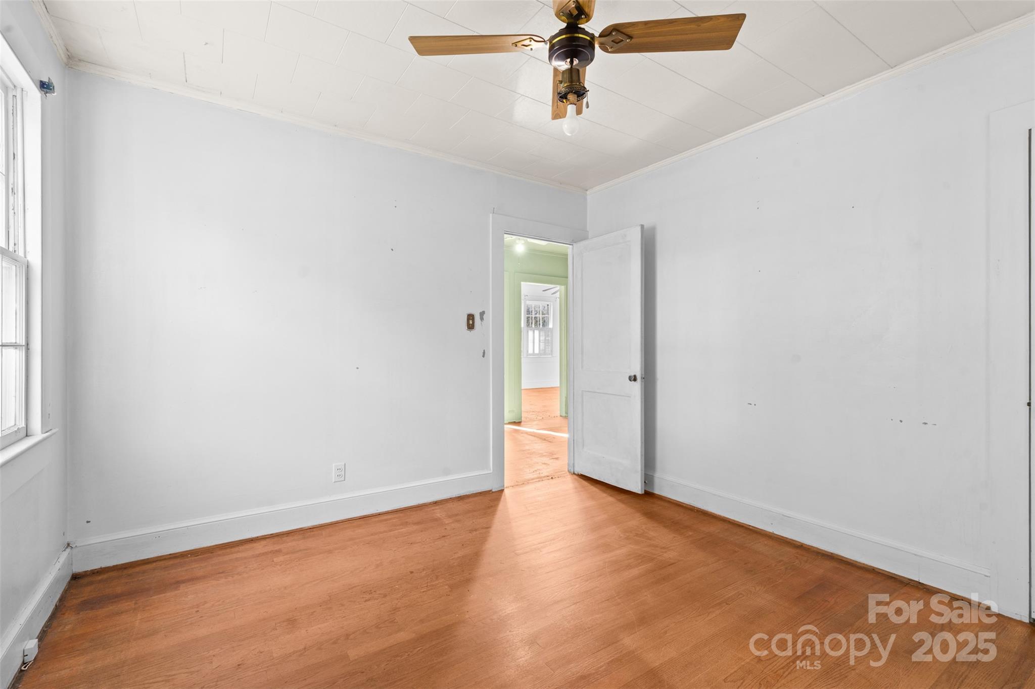 811 South Cherry Road Rock Hill, SC 29730 - Photo 12 of 22 a view of room with hardwood floor and ceiling fan