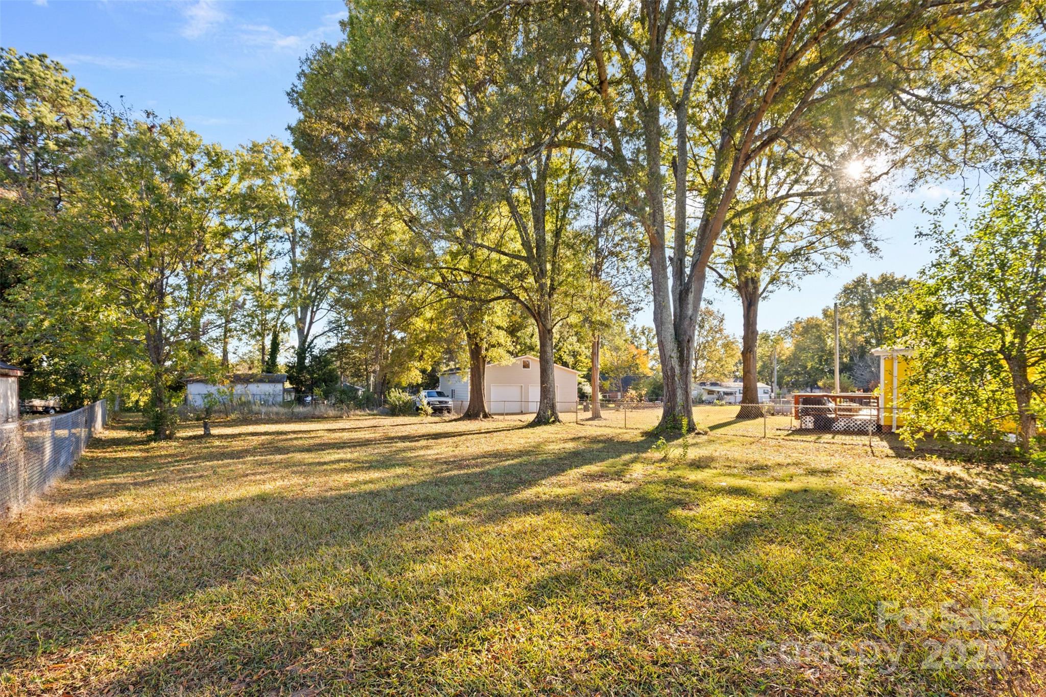 811 South Cherry Road Rock Hill, SC 29730 - Photo 17 of 22 a view of a yard with large trees
