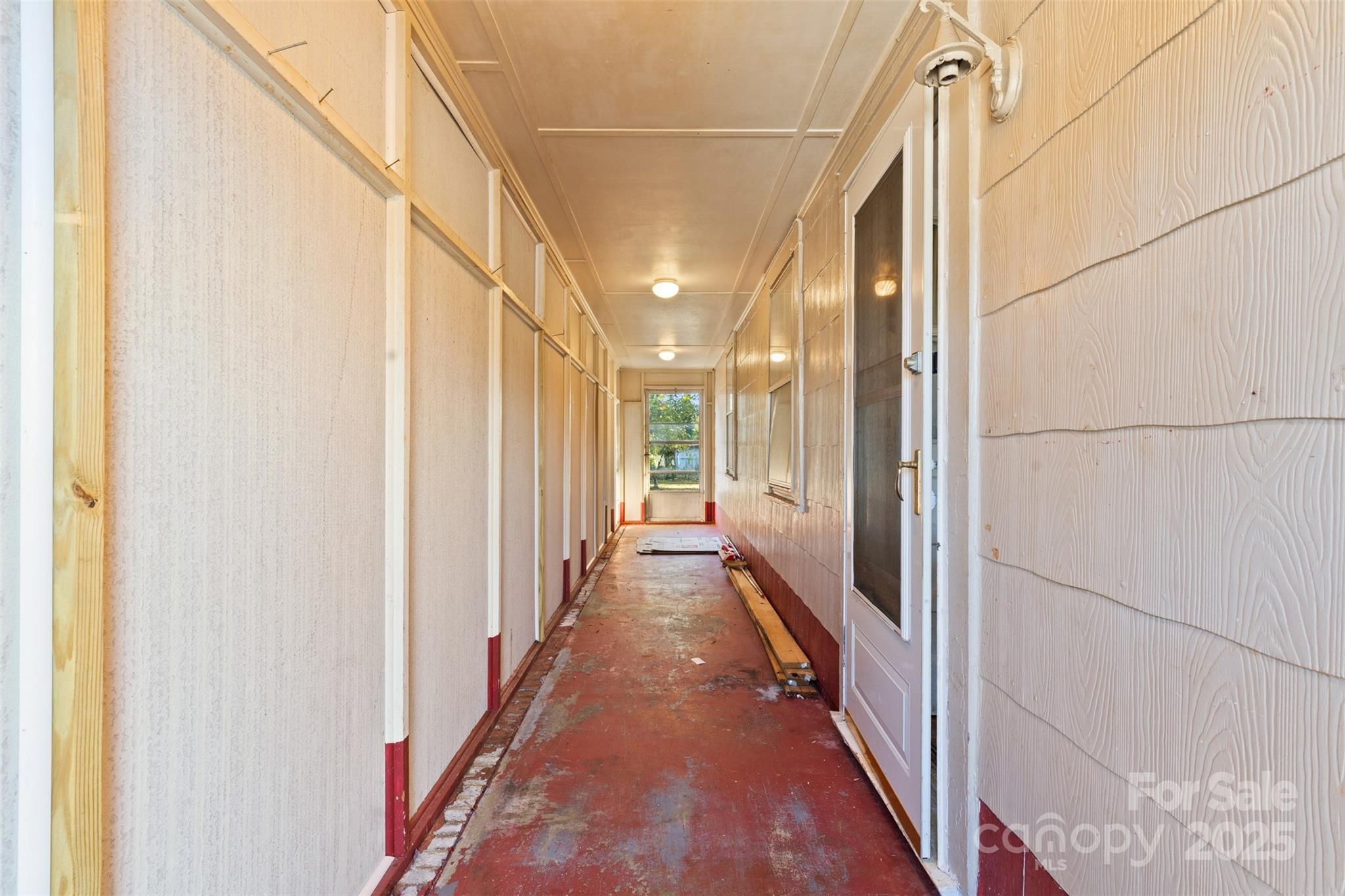 811 South Cherry Road Rock Hill, SC 29730 - Photo 3 of 22 a view of a hallway with wooden floor and staircase