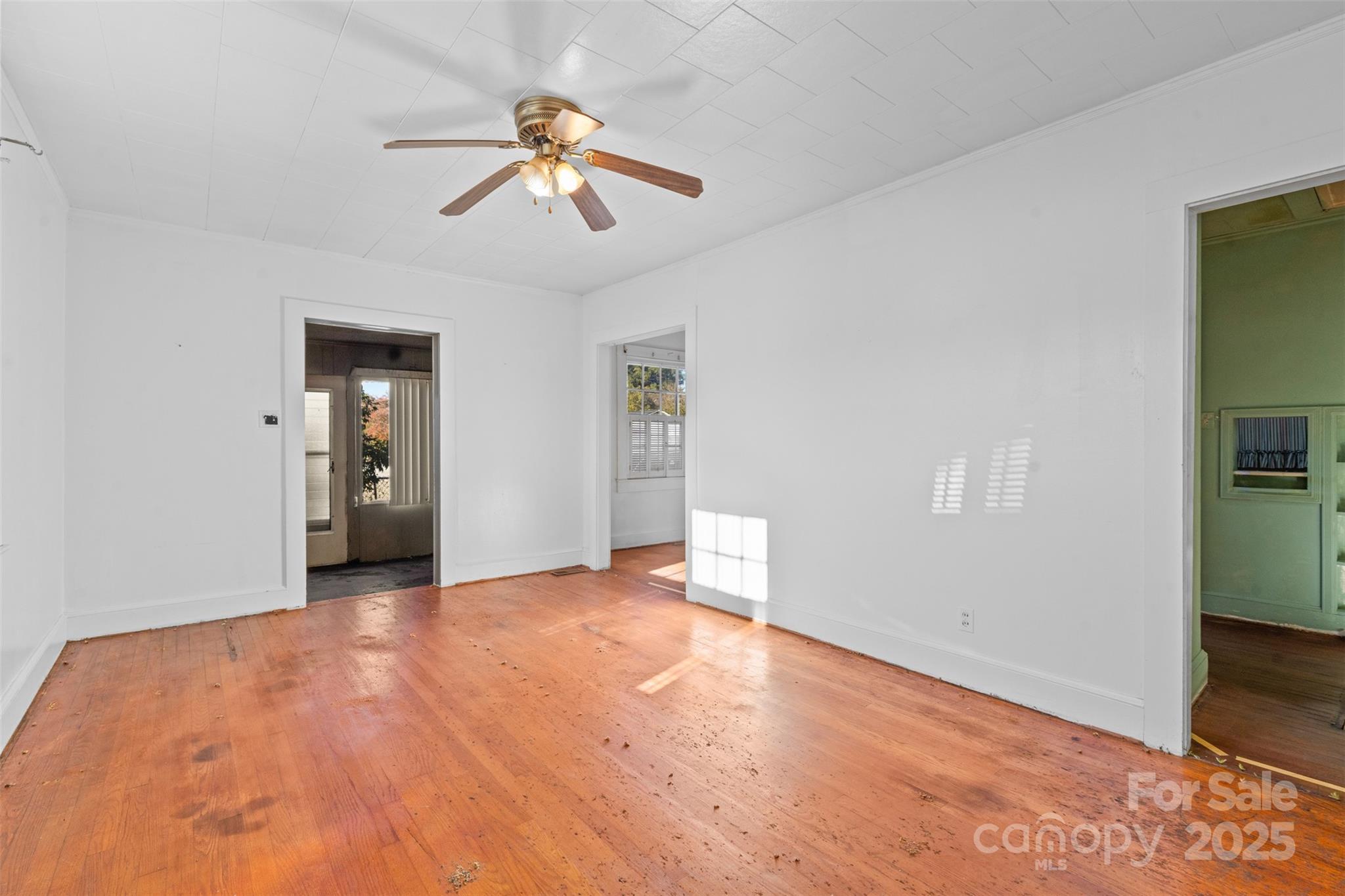 811 South Cherry Road Rock Hill, SC 29730 - Photo 9 of 22 wooden floor in an empty room with a window