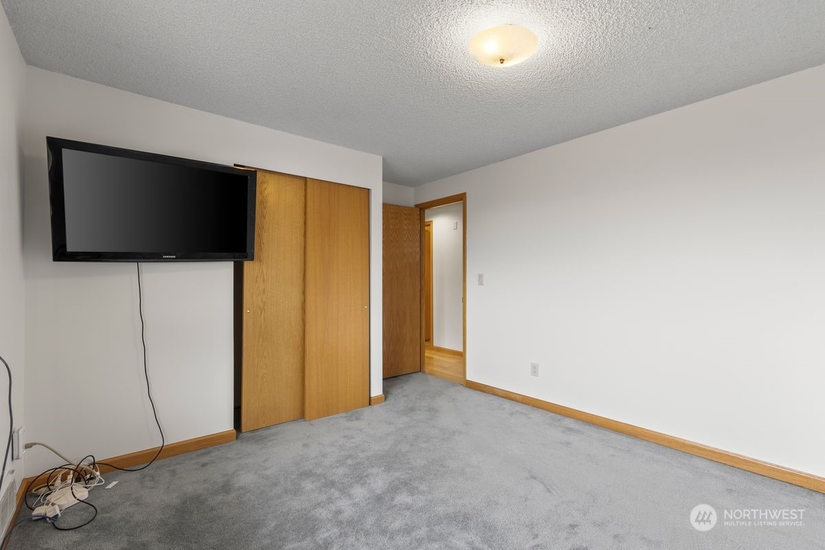 120 Echo Glen Place Yakima, WA 98908 - Photo 20 of 40 a view of an empty room with a flat screen tv