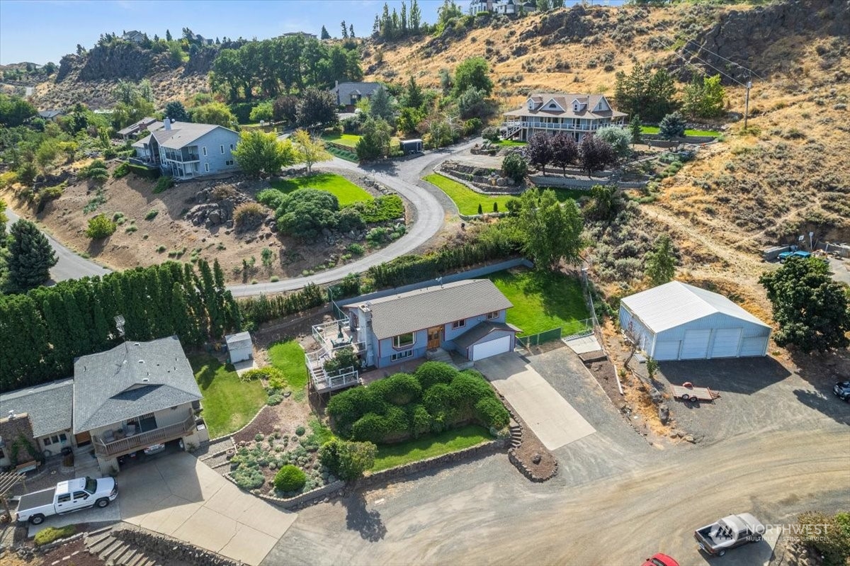 120 Echo Glen Place Yakima, WA 98908 - Photo 36 of 40 an aerial view of a house with garden space and street view