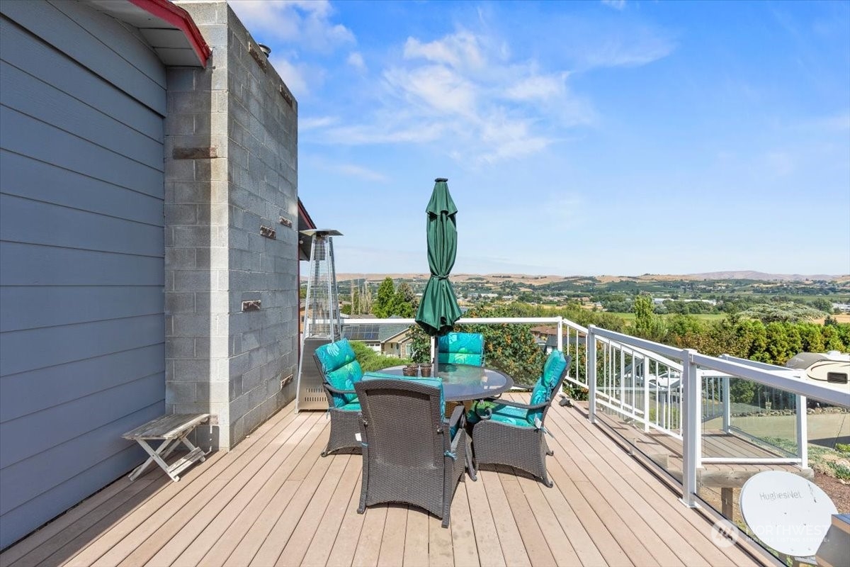 120 Echo Glen Place Yakima, WA 98908 - Photo 7 of 40 a view of a balcony with chairs and a table
