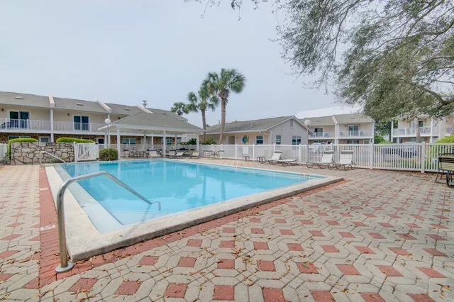 a view of a house with a swimming pool