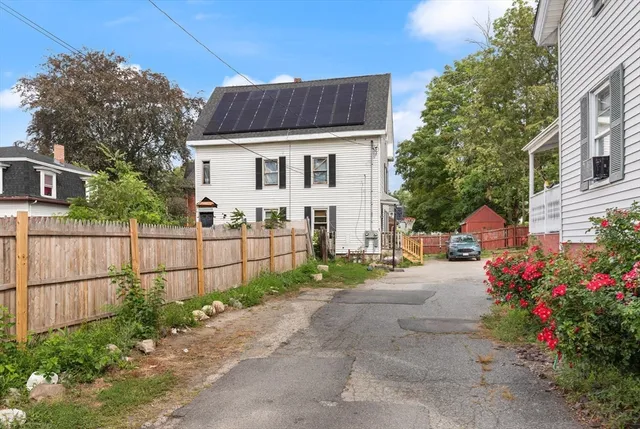 a front view of a house with a garage