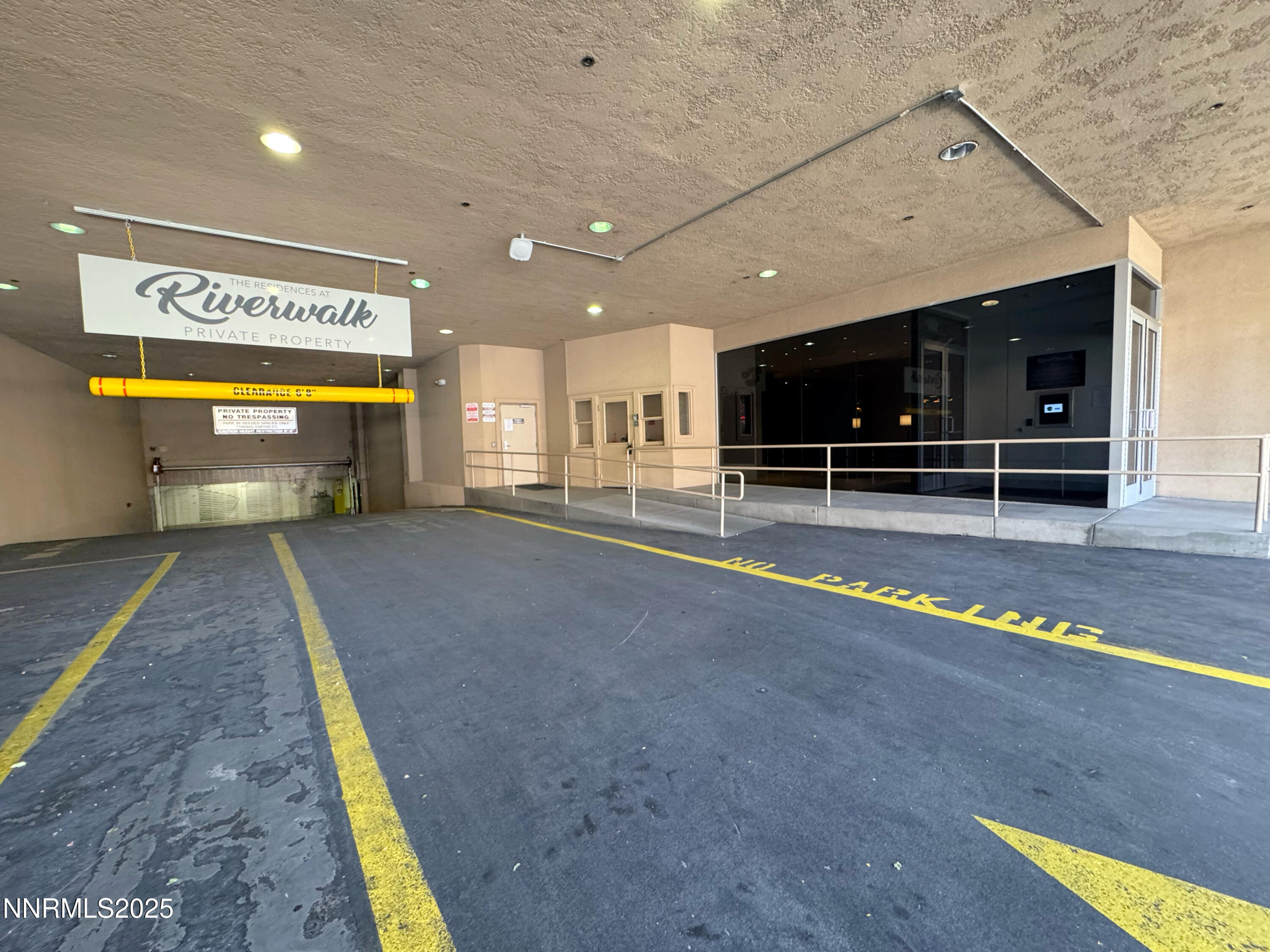 200 West 2nd Street, Unit 1107 Reno, NV 89501 - Photo 13 of 29 a view of a hall with floor to ceiling windows