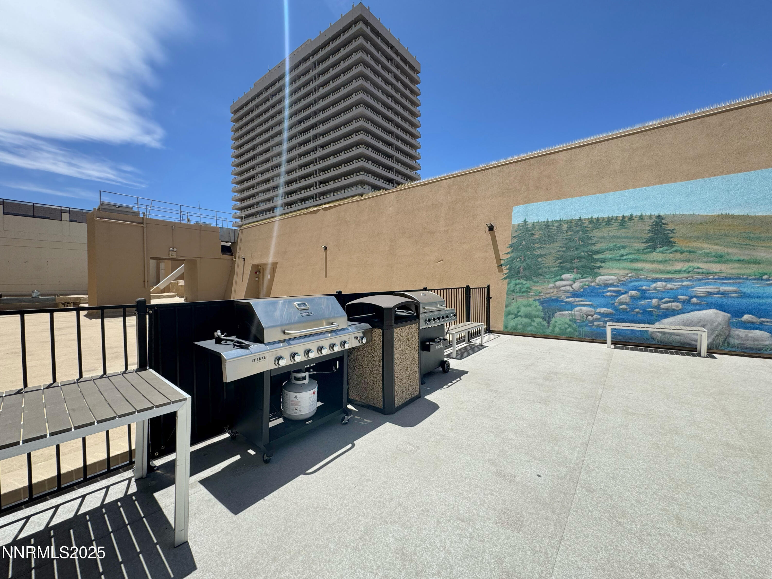 200 West 2nd Street, Unit 1107 Reno, NV 89501 - Photo 21 of 29 a view of a patio with a table and chairs