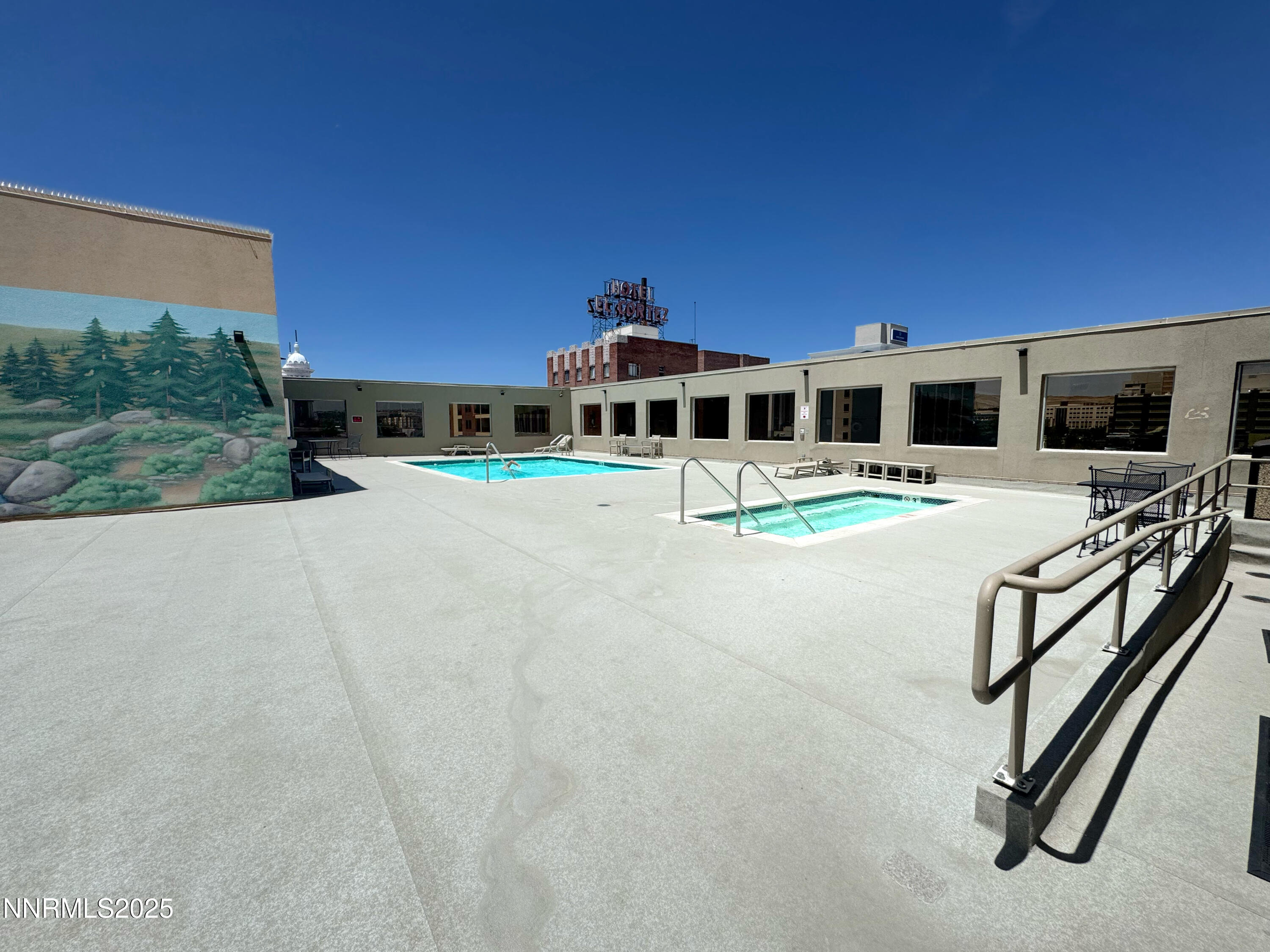 200 West 2nd Street, Unit 1107 Reno, NV 89501 - Photo 22 of 29 a view of a patio with swimming pool