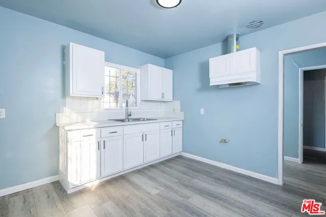 a bathroom with a sink a toilet and a bathtub