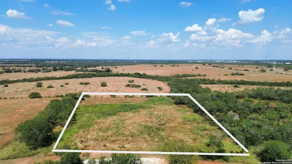 a view of swimming pool from a balcony