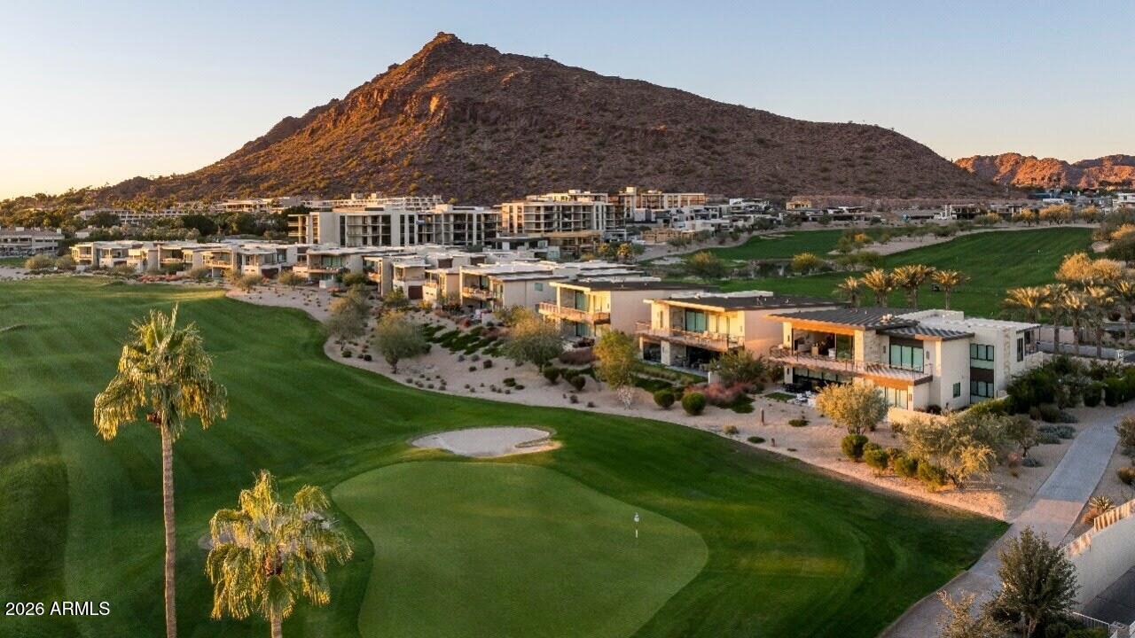 5000 North Camelback Ridge Drive, Unit 206 Scottsdale, AZ 85251 - Photo 3 of 62 a view of a house with a garden