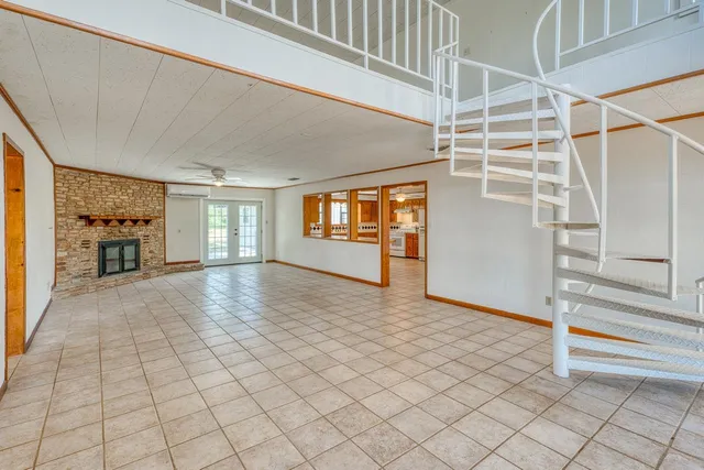 a view of an empty room and window