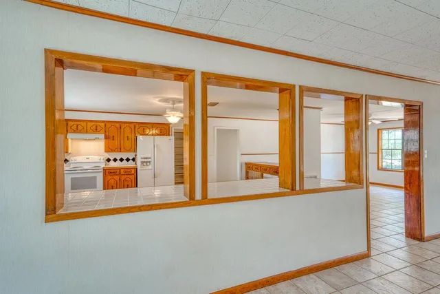 a view of an empty room and window