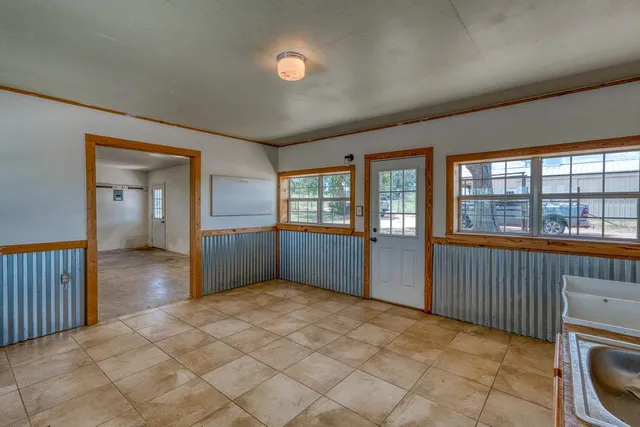a view of an empty room and window