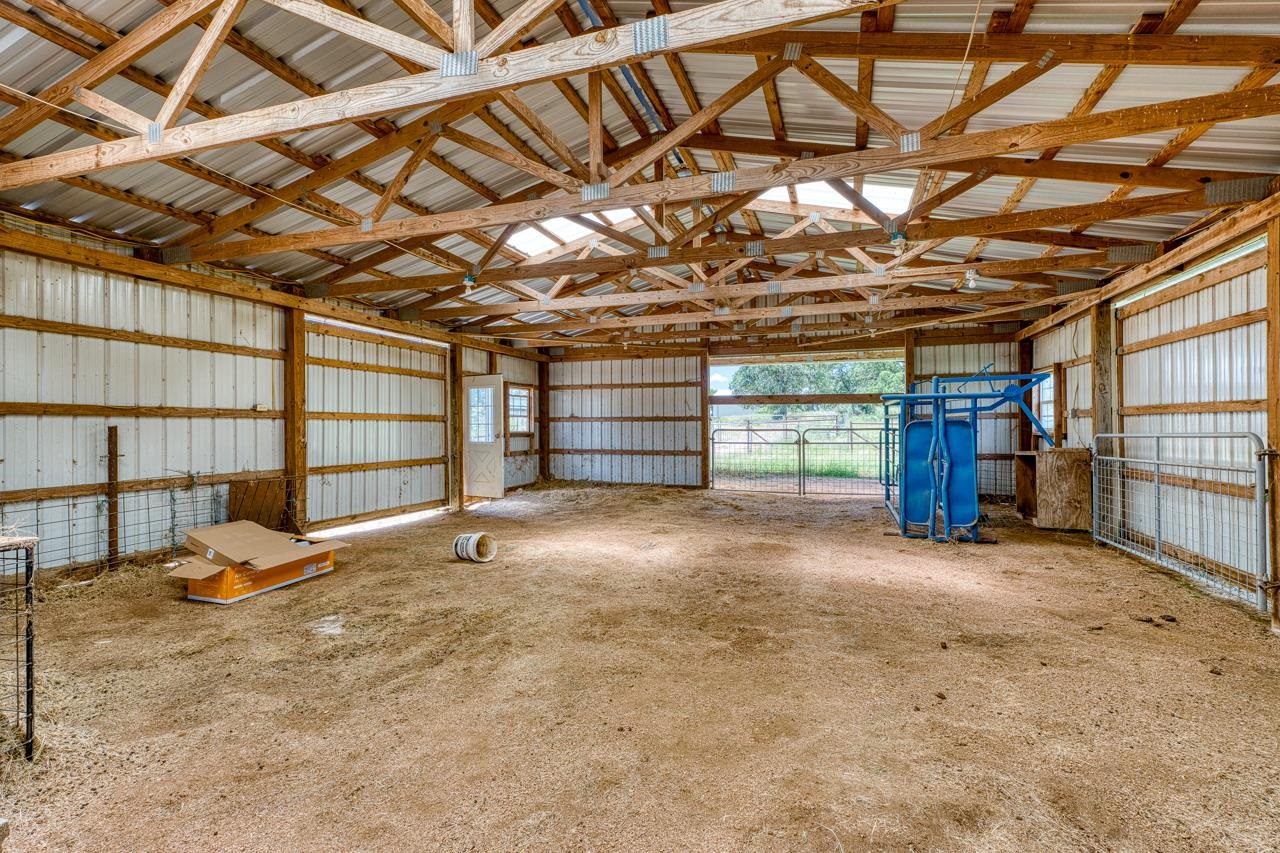 6552 Cr 403 Valley Spring Llano, TX 78643 - Photo 30 of 30 a view of a room with wooden walls