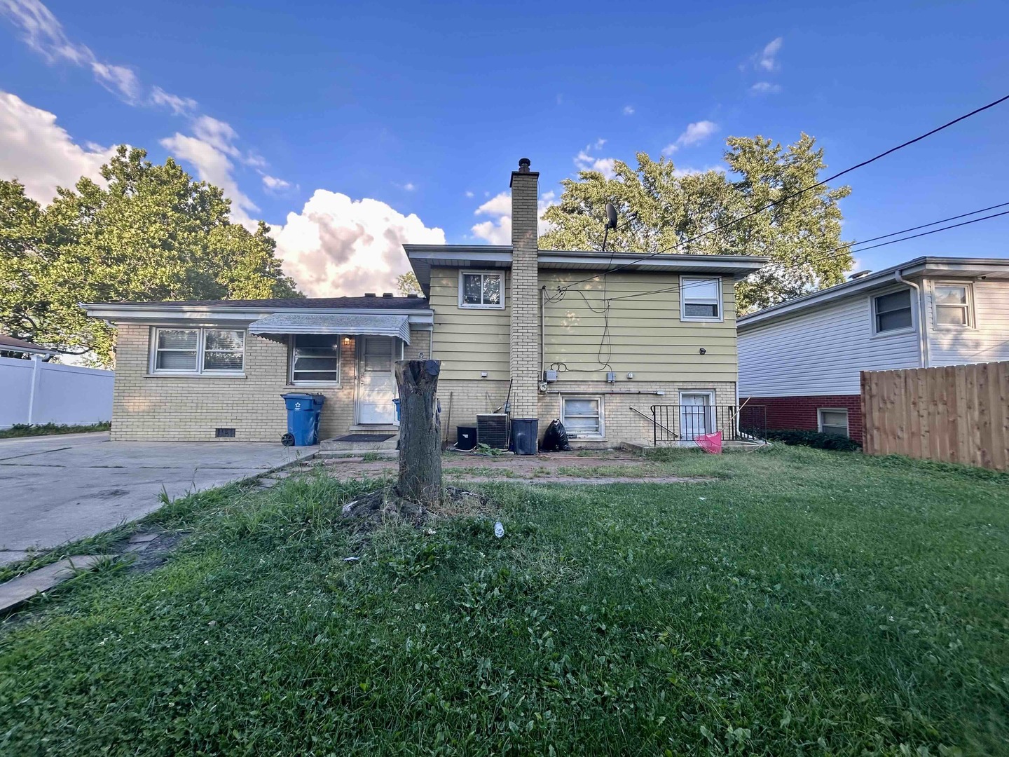10 Adams Drive Addison, IL 60101 - Photo 12 of 12 a front view of a house with a yard and garage