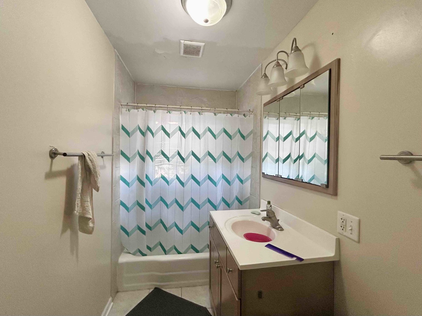 10 Adams Drive Addison, IL 60101 - Photo 8 of 12 a white bath tub sitting next to a white sink