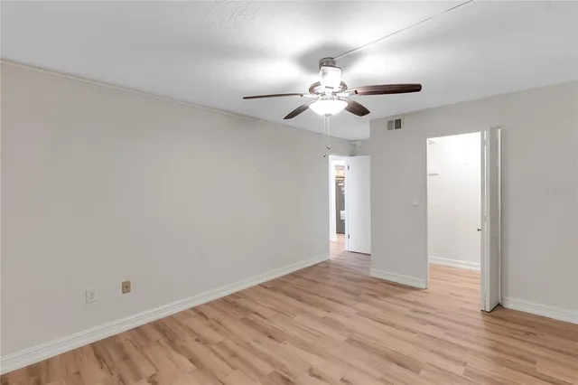 a kitchen with stainless steel appliances a sink a stove a microwave a sink and cabinets