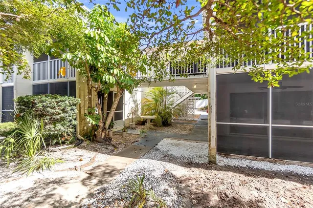 a bathroom with a shower and a sink